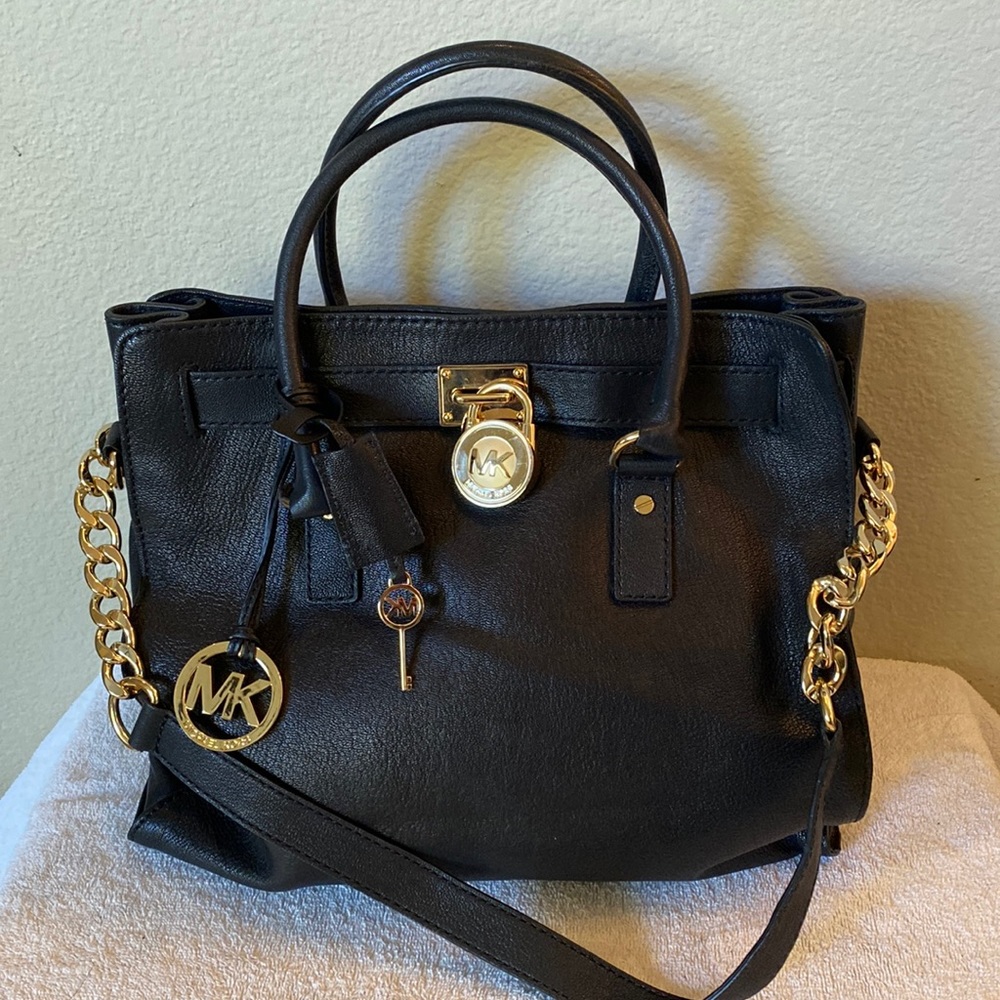 Beautiful brand new Michael Kors handbag with lock and key!